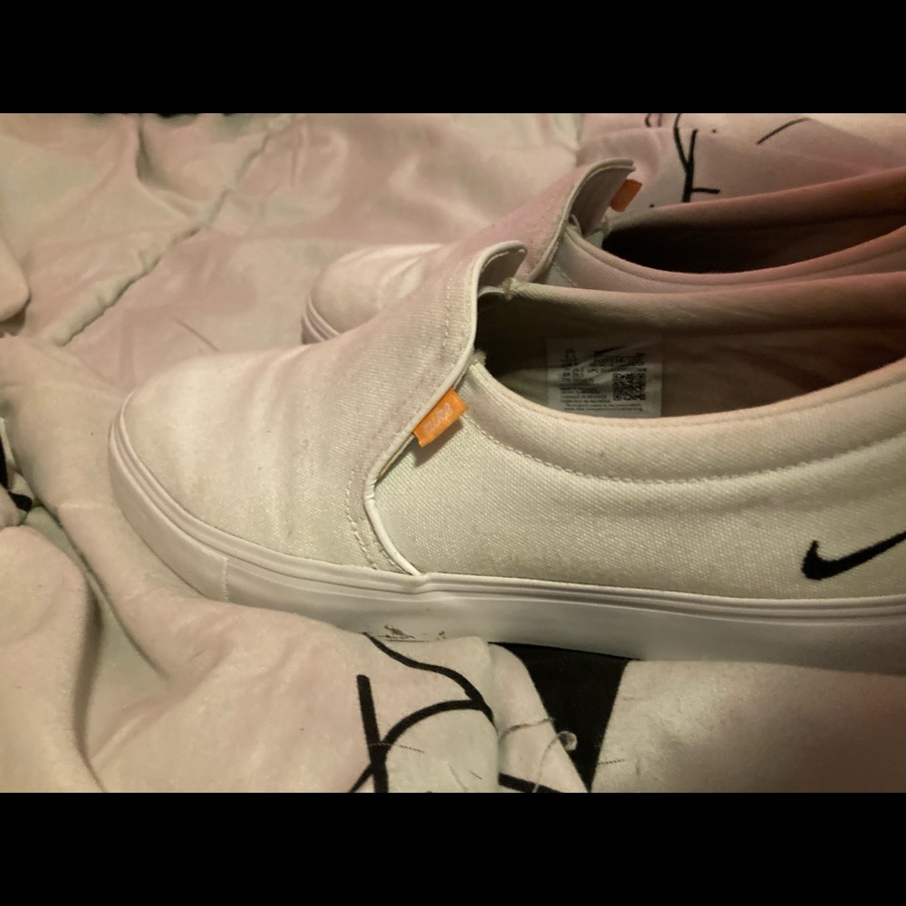 White Nike slip ons Woman’s size 10
